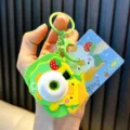 Llavero creativo de cámara de pato de dibujos animados verde para mochilas y llaves - Pato / Verde