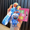 Stylish blue astronaut bear keychain charm for bags with embossed DREAM strap and pink card - Star & Bear / Blue