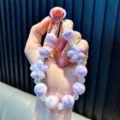 Cute iridescent purple beaded phone charm lanyard with flower accents for keychains - Purple