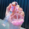 Kawaii rosa muschelförmiger Flüssigöl Schlüsselanhänger mit Glitzer und Armband-Deko - Rosa Seestern Muschel
