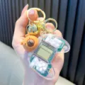 Mini console portatile Tetris trasparente portachiavi con un simpatico ciondolo orso - Bianco