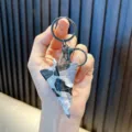Camouflage fighter jet keychain with metal alloy pull-back airplane model for keys - Black