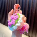 Handmade pink flower crochet keychain accessory, cute knitted bag charm for women - Pink