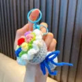 Adorable hand-crocheted colorful mini bouquet keychain accessory for girls' bags and keys - Blue Multicolor