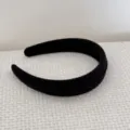 Close-up of black corduroy padded headband showing ribbed texture and high-top design - Black Headband