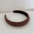Close-up detail of brown ribbed texture on a padded high top sponge headband - Light Coffee Headband