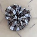 Detail of vintage preppy plaid scrunchie featuring multiple delicate grey ribbon bow accents - Blue Coffee Plaid Bow Scrunchie