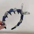 Detail of blue floral rabbit ear headband with hair teeth for high cranial top look. - Blue Floral Bow