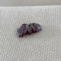 Detail view of a vintage padded grey scrunchie hair clip with a handmade button - Purple Snap Clip (FJ83662)