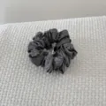 Detailed view of the soft pleated texture on a vintage grey cotton-filled hair scrunchie - Gray Hair Scrunchie (FJ83662)