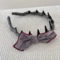 Detail of vintage gray headband with decorative bow and integrated black hair clips - Purple Bowknot Headband (FJ83662)