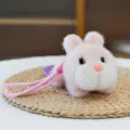 Soft pink plush rabbit keychain pendant featuring a heart nose and pink hanging cord - Prone Pink Rabbit / 14cm / Pink