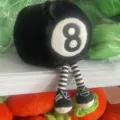 Adorable black 8-ball plush toy featuring long striped legs and tiny sneakers design - Black 8 Ball Style / 36cm