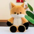 Cute soft orange and white fox plush toy sitting comfortably on a white textured surface - Running Fox / 36cm