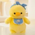Adorable yellow duck plush toy with blue headband and embroidered happy bib detail - Yellow Duck / 35cm