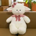 Adorable plush sheep toy wearing a stylish pink sailor outfit sitting on a cozy sofa - Sailor Style / 32cm