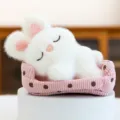 Adorable sleeping white plush bunny doll with pink bed desk ornament SKU variant - White Rabbit / 16cm