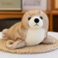 Peluche de león marino marrón realista y suave con vientre crema en posición tumbada - 27cm / Marrón