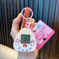 Llavero electrónico rosa en forma de triángulo con pantalla LCD y dibujos - Rosa