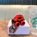 Red pull-back fire truck model keychain toy for kids and collectible backpack accessory - Rescue Vehicle