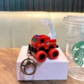 Red miniature fire truck toy keychain featuring adjustable ladder and off-road tires - Ladder Truck