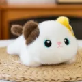 Niedliche Plüschkatze Handgelenkauflage mit weißem und braunem Fell. - Dreifarbige Katze / 17cm