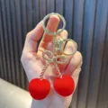 Exquisite cute red flocked cherry keychain with gold bow pendant for car key bag decoration - Cherry / Red