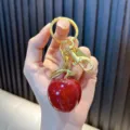 Cute red glitter resin fruit keychain with high-quality golden metal ring hardware. - Small Apple / Transparent Pink