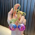 Exquisite metallic purple and blue gradient cherry keychain with golden hardware - Cherry / Dazzling Pink Blue