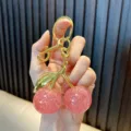 Cute resin cherry keychain with pink glitter texture and gold hardware for car keys - Cherry / Light Pink
