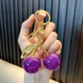 Charming purple glitter resin cherry keychain with golden ring for car keys and bags - Cherry (Fine Glitter) / Purple