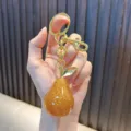 Cute sparkling golden glitter resin fruit-shaped keychain with gold-tone hardware - Pear (Fine Glitter) / Yellow Pear