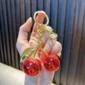 Cute red cherry keychain with metallic finish and gold metal keyring for car bags - Glossy Cherry Red