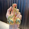 Elegant gold-tone double cherry keychain variant with high-shine metallic finish - Glossy Cherry Gold