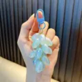 Delicate iridescent pale blue resin grape cluster keychain with a blue lobster clasp. - Grape / Iridescent Blue