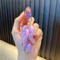 Handheld purple resin grape keychain with pearlescent finish and matching clasp - Iridescent Grape / Purple
