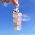 Cute colorful resin sugar orange style beaded keychain with bell against blue sky - Color-Changing Grape / White