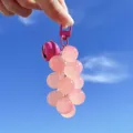 Cute pink resin grape fruit keychain pendant with matching bell accessory for car keys - Color-Changing Grape / Rose Red
