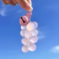 Exquisite and cute pink resin grape fruit shaped keychain pendant with matching bell charm - Color-Changing Grape / Pink