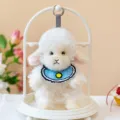 Cute white curly plush sheep pendant with blue bib on a white display stand - Charm / White Sheep Yellow Face / 15cm