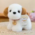 Soft white plush puppy dog toy with brown ears and gold tag sitting on woven mat - Labrador / 15cm