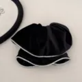 Close-up of elegant black velvet hair scrunchie with sparkling rhinestone edges - Black Velvet Rhinestone - Ponytail Clip