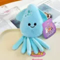 Cute light blue plush octopus fridge magnet with a smiling cartoon face for home decor - Squid