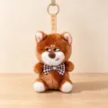 Cute brown plush Shiba Inu dog keychain with a checkered bow tie and leather strap - 15cm / Shiba Inu