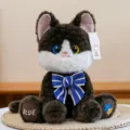 Lindo peluche de gato blanco y negro con pajarita azul y ojos de diferentes colores - Negro / 28cm