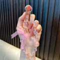 Rosafarbener perlenbesetzter Kristall-Handyriemen mit Schleife - Rosa