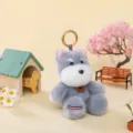 Niedlicher grauer Plüschtier-Schlüsselanhänger mit Happy-Anhänger und Streifendetail - Schnauzer