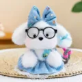 Cute white plush puppy keychain featuring black glasses and a blue bow accessory - Tie-Dye Denim