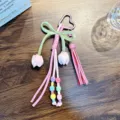 Handmade pink and green tulip braided bag charm with heart clasp and decorative tassel - Pink