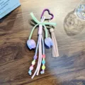 Cute handmade woven tulip bag charm with purple heart carabiner and stylish tassel - Purple